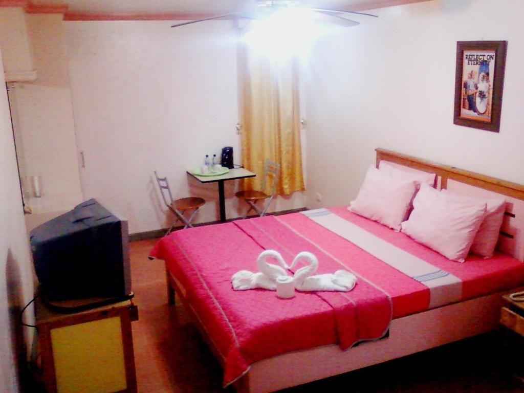 באגויו Oyo 765 Ibay Zion Hotel חדר תמונה