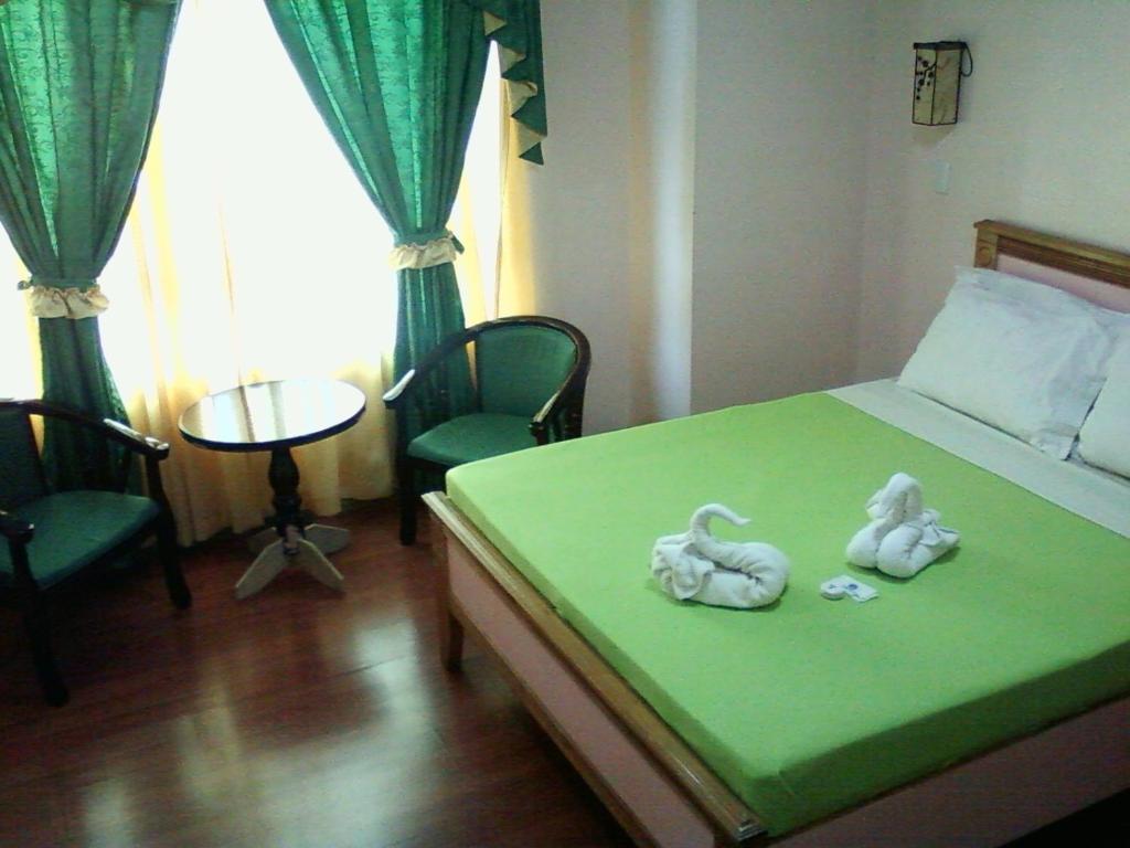 באגויו Oyo 765 Ibay Zion Hotel חדר תמונה