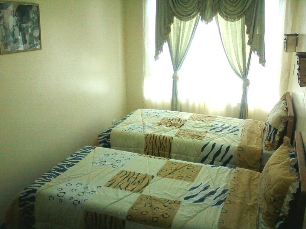 באגויו Oyo 765 Ibay Zion Hotel חדר תמונה